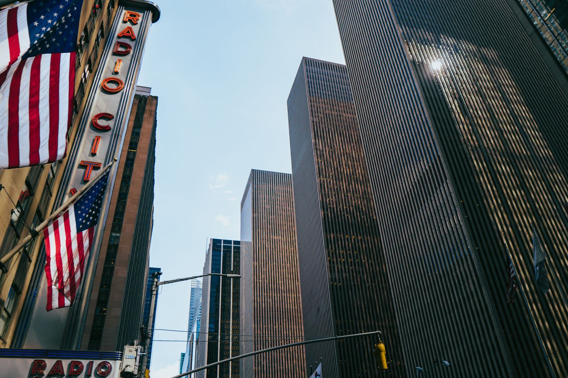 View of Radio City and skyscrapers, capturing NYC's vibrant urban landscape.